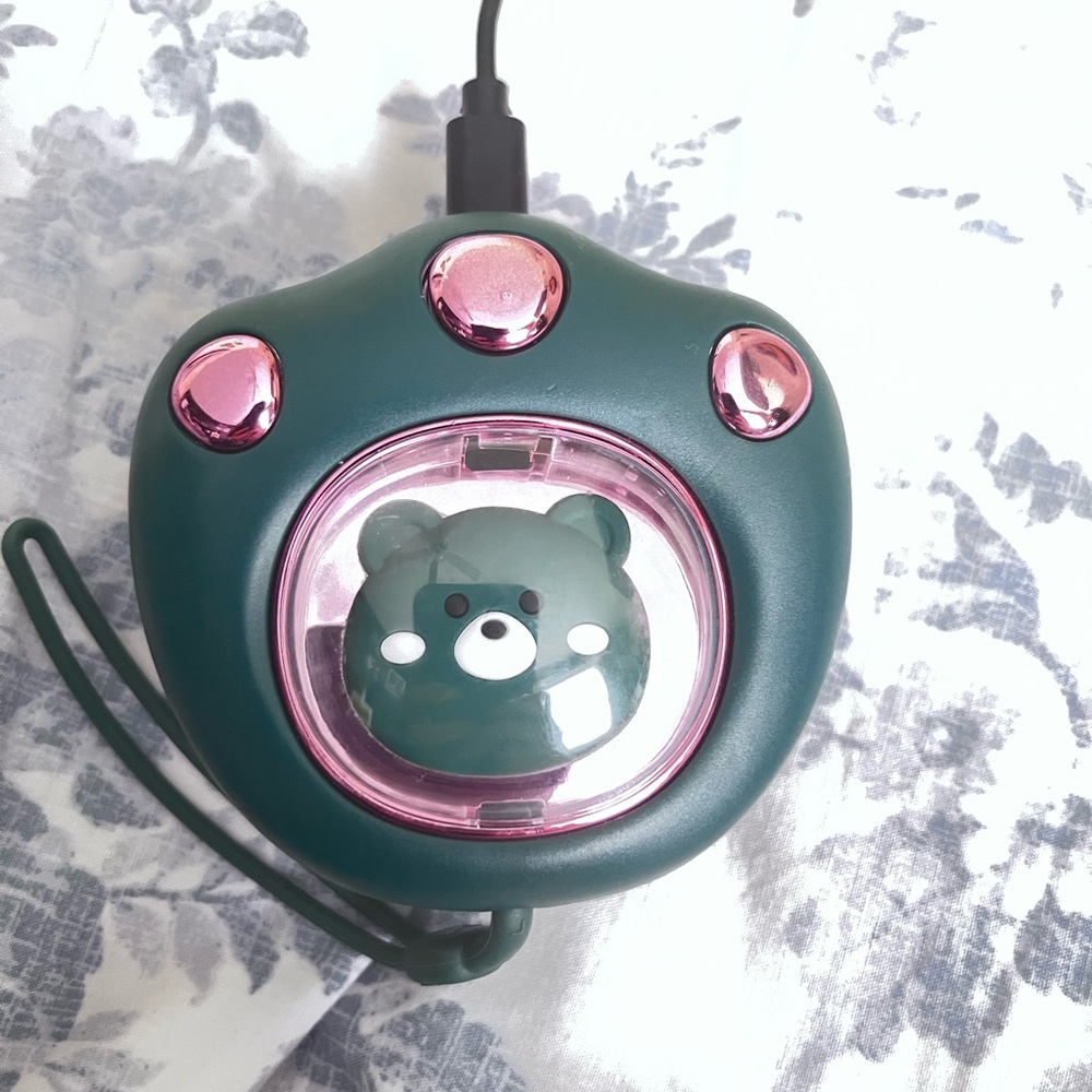 Green and Pink Bear-Themed paw hand warmer